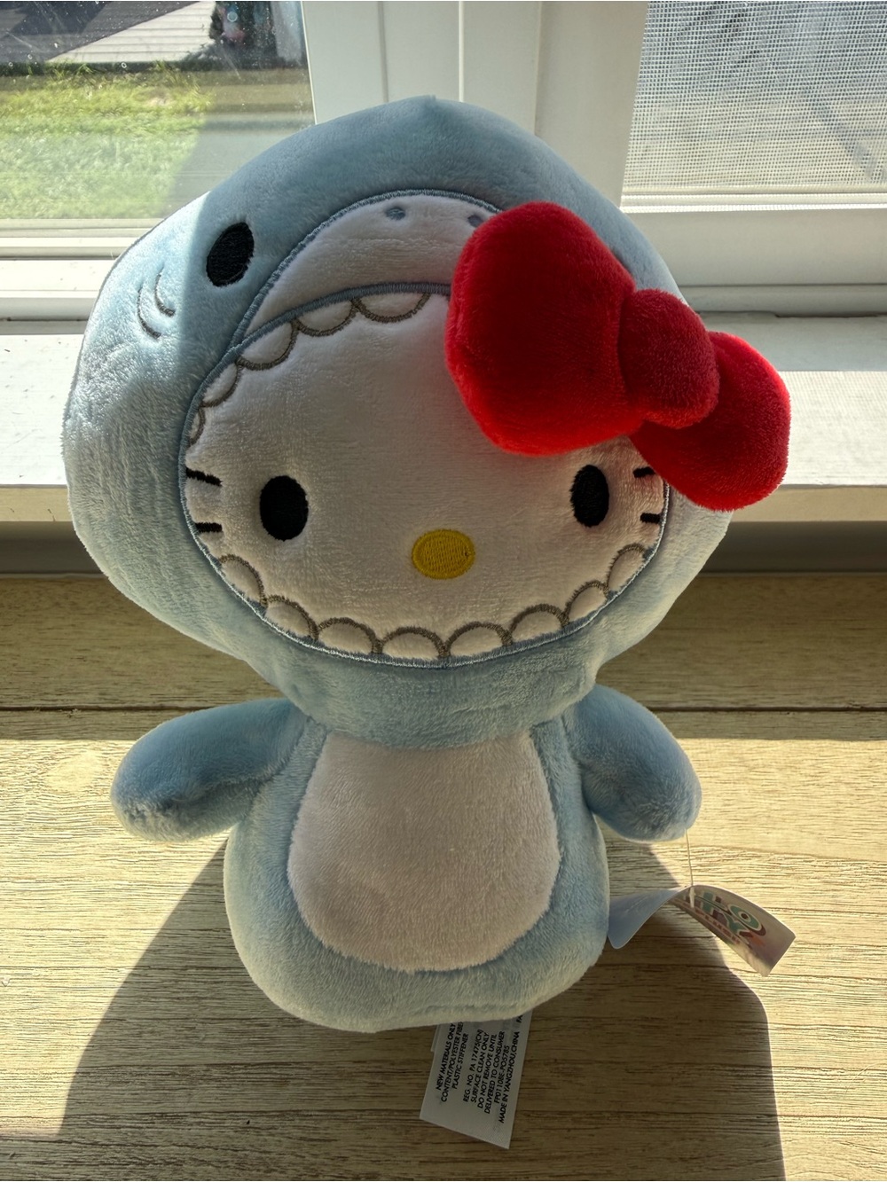 Hello Kitty in Axolotl Costume